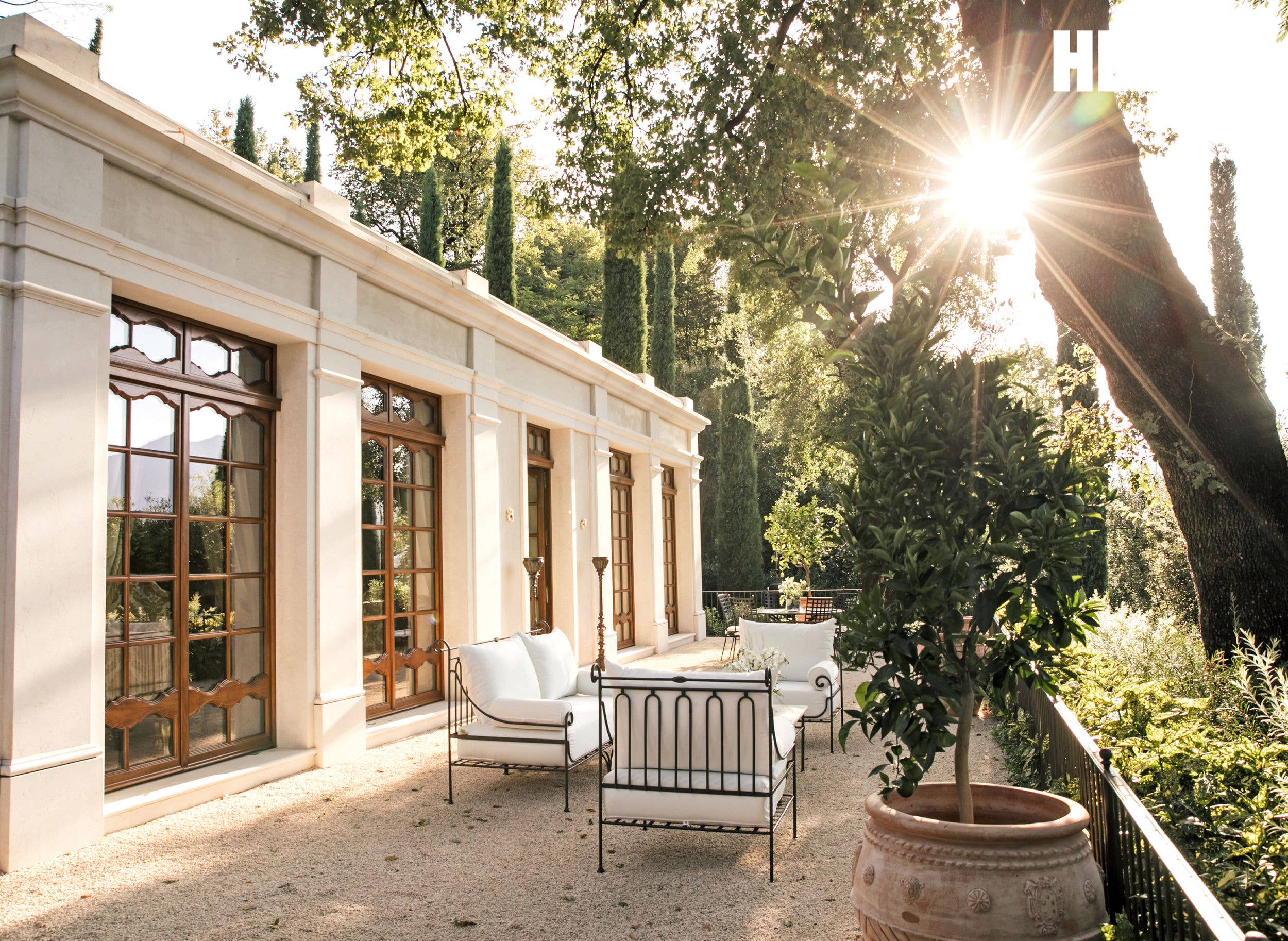 Outdoor seating area outside Villa Portesina
