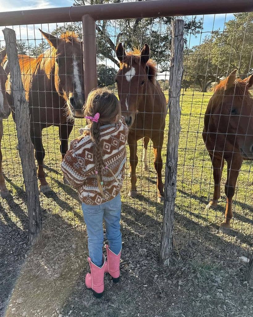 Gigi Hadid's daughter Khai feeding horses