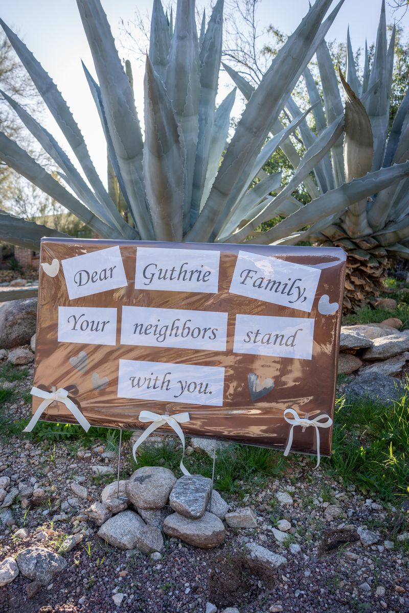 A sign is posted at the house of Nancy Guthrie, NBC host Savannah Guthrie's mother,.