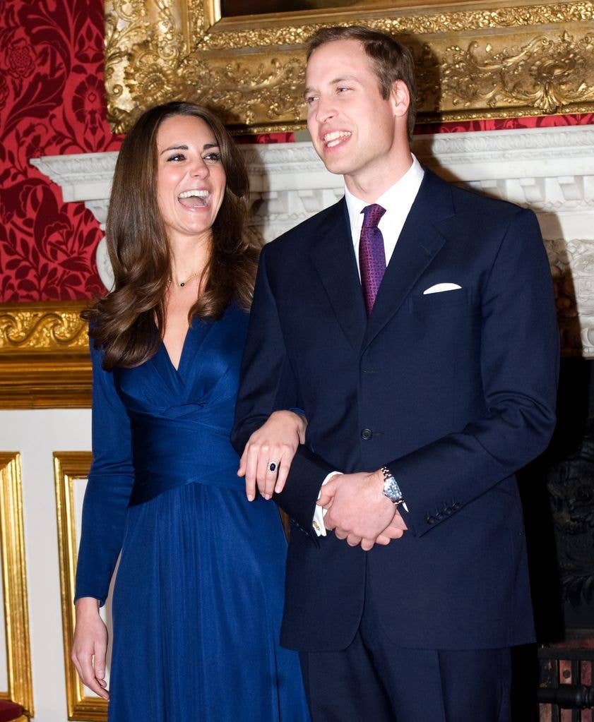 Prince William and Kate Middleton laughing as they pose for engagement photographs in St James's Palace on 16 November 2010
