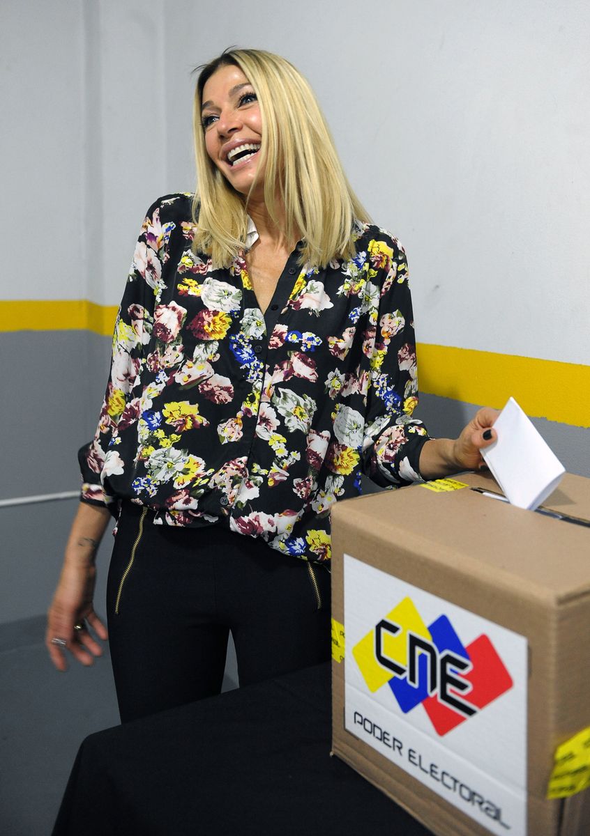Venezuelan actress Catherine Fulop casts her vote at the Venezuelan embassy in Buenos Aires on April 14, 2013.