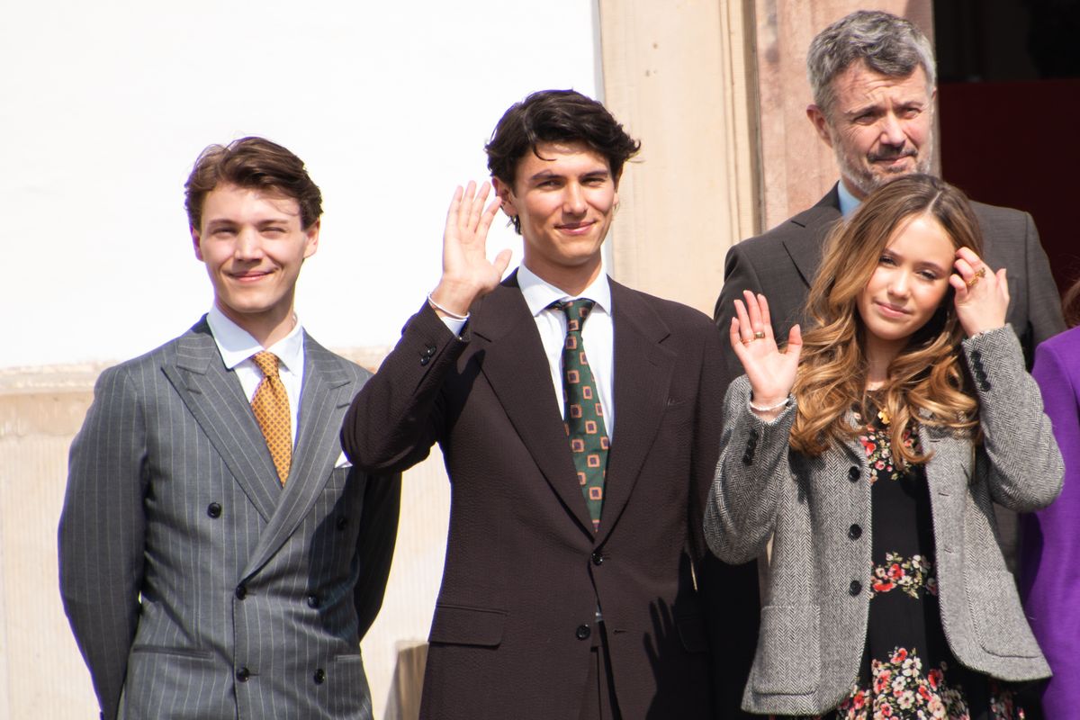 Count Felix of Monpezat, Count Nikolai of Monpezat, Princess Josephine and King Frederik wave during Queen Margrethe's 85th birthday in the Inner Palace Courtyard at Fredensborg Palace.