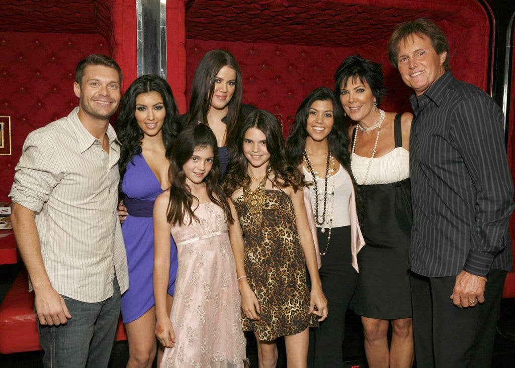 L-R: Ryan Seacrest, Kim Kardashian, Kylie Jenner, Khloe Kardashian, Kendall Jenner, Kourtney Kardashian, Kris Jenner and Bruce Jenner pose for a photo in 2007