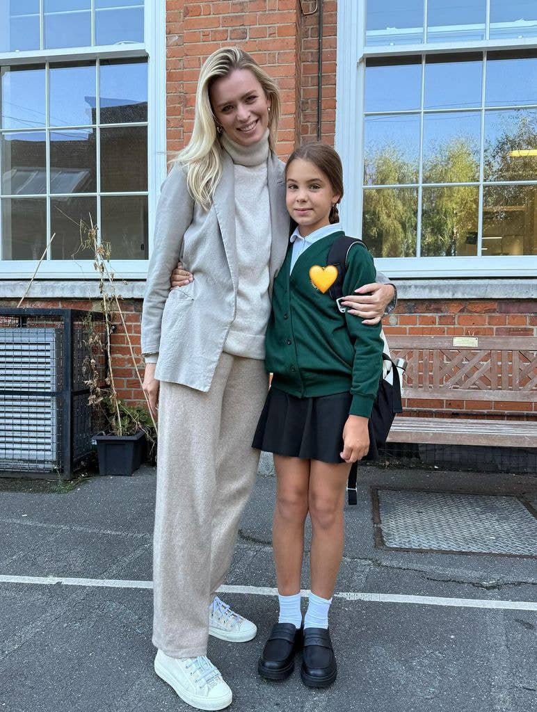 Nadiya Bychkova with her daughter in a school playground