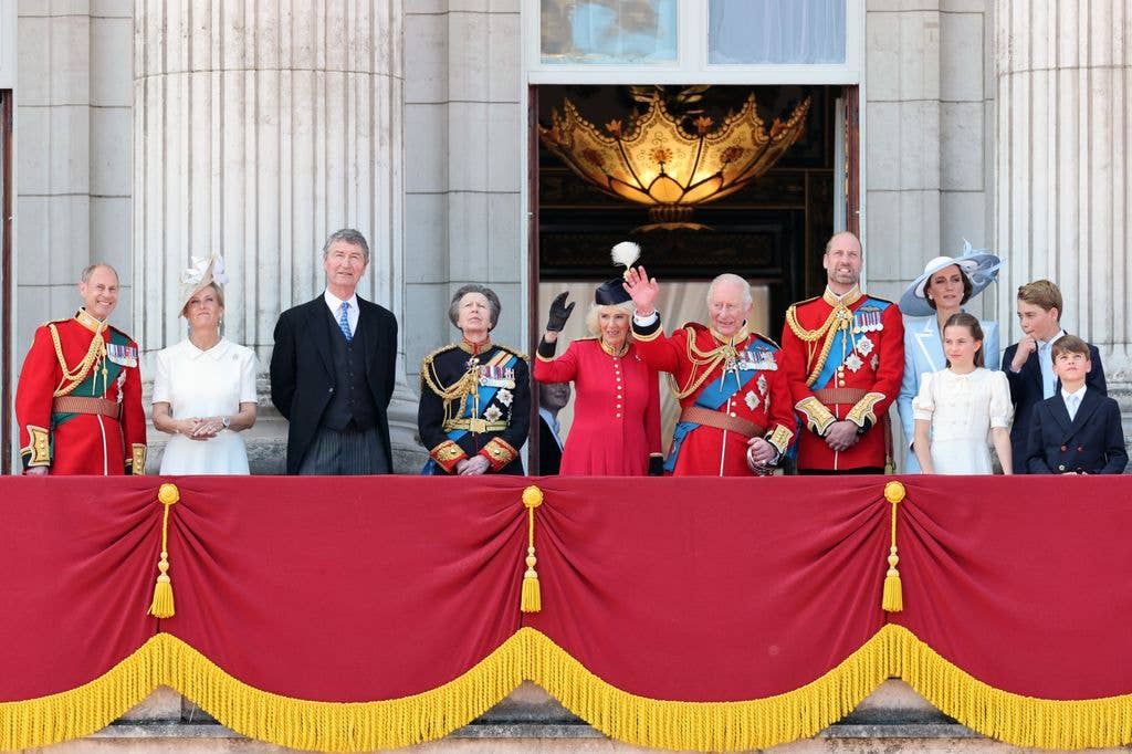 The family were all smiles on the balcony