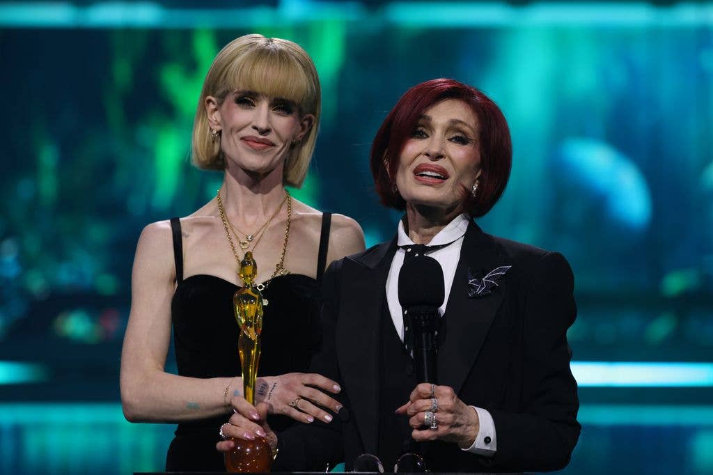 Kelly Osbourne and her mother Sharon accept the 'Lifetime Achievement' award on behalf of the late Ozzy Osbourne during the 2026 The BRIT Awards