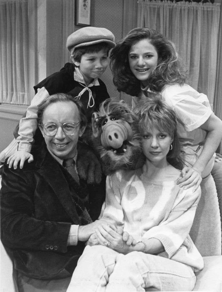 Max Wright, Benji Gregory, Andrew Elson and Anne Shedeen with ALF in a promotional still for TV show 'ALF', dated 1986.