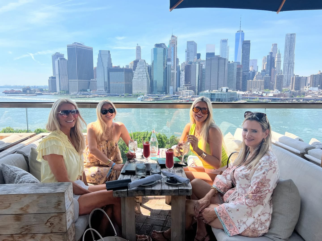 Tess shared a snap of the family enjoying lunch with a view of the Manhattan skyline in the background