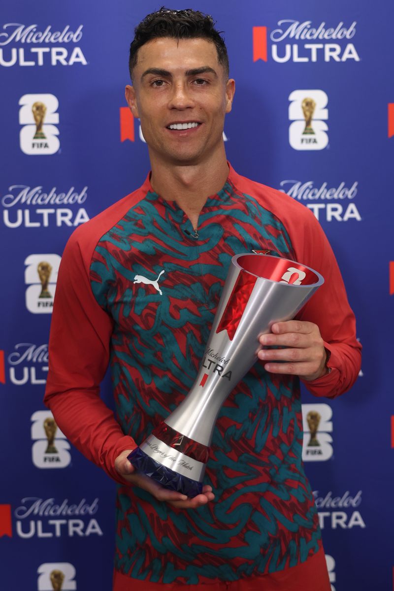Cristiano Ronaldo #7 of Portugal poses for a photograph with the Superior Player of the Match award after the FIFA World Cup 2026 Group K match 