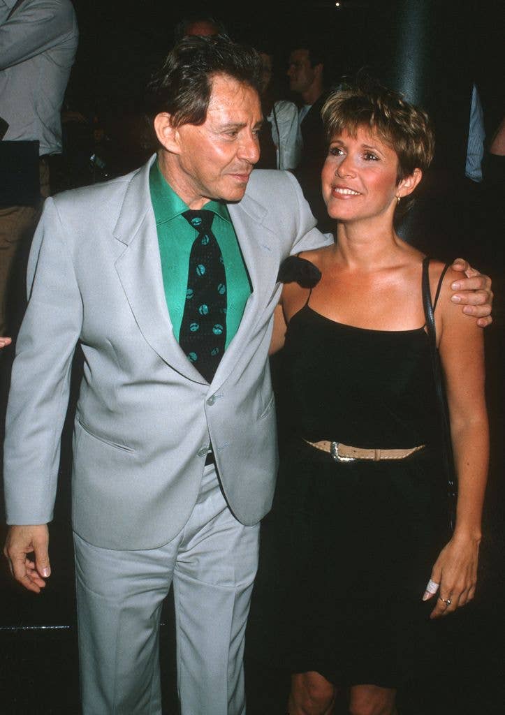 Eddie Fisher with his arm around Carrie Fisher