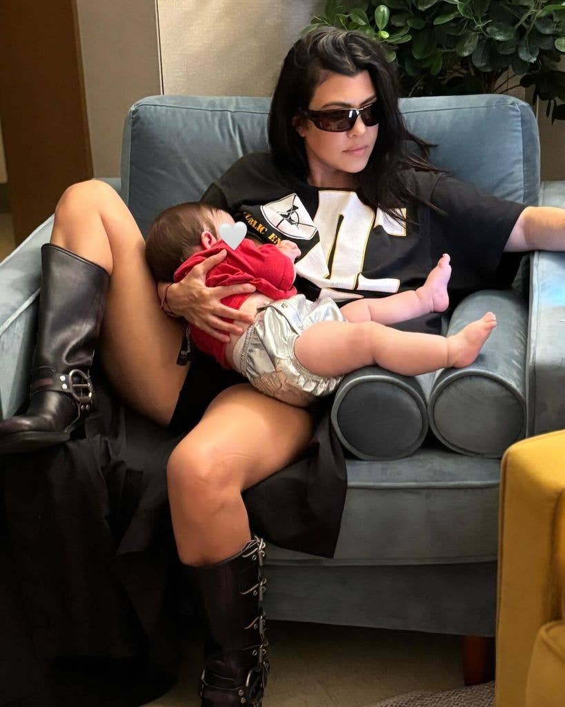 Kourtney Kardashian holding baby son Rocky