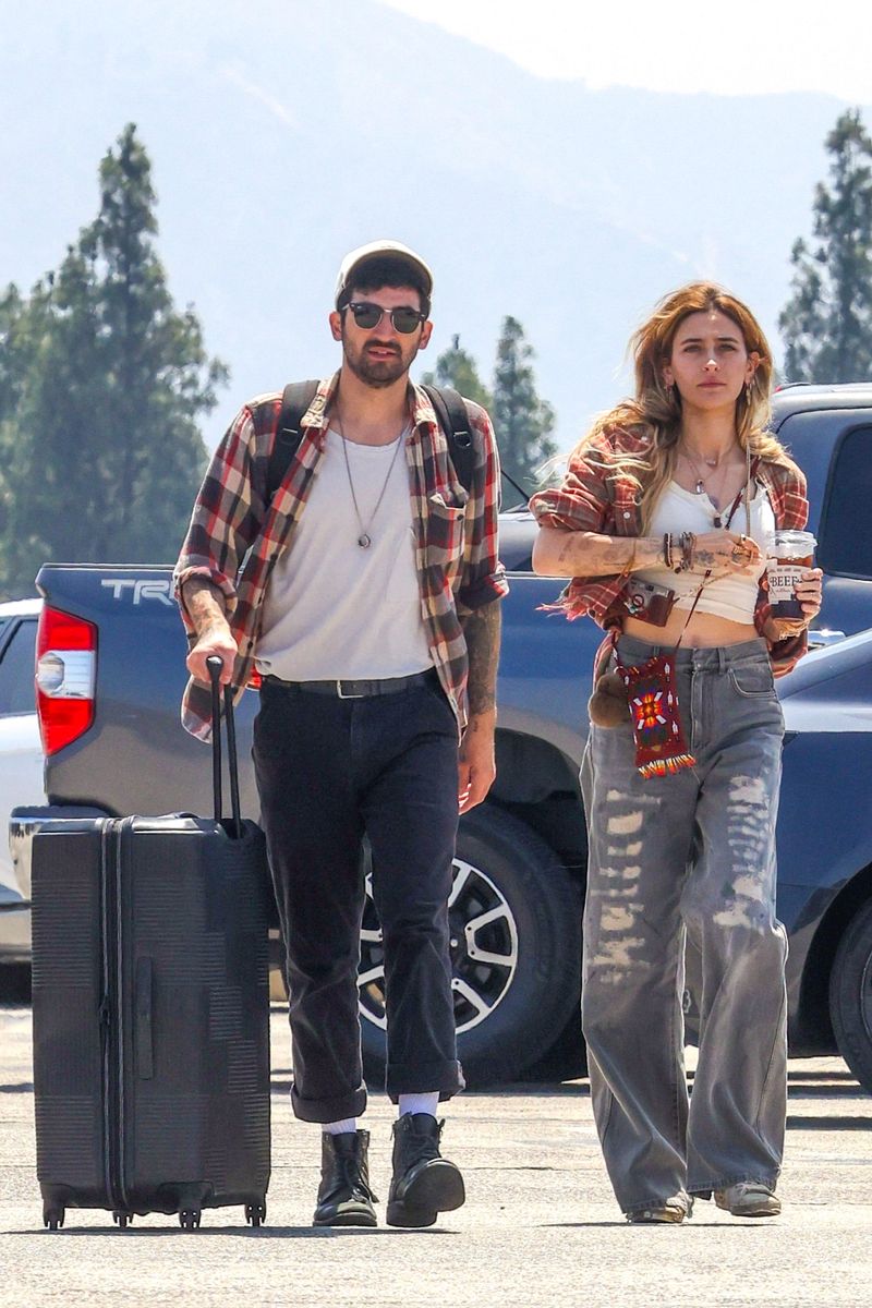 Paris Jackson appeared to drop off rumored boyfriend Hayden Karchmer at Burbank Airport as the pair stepped out in effortlessly coordinated boho-inspired looks.