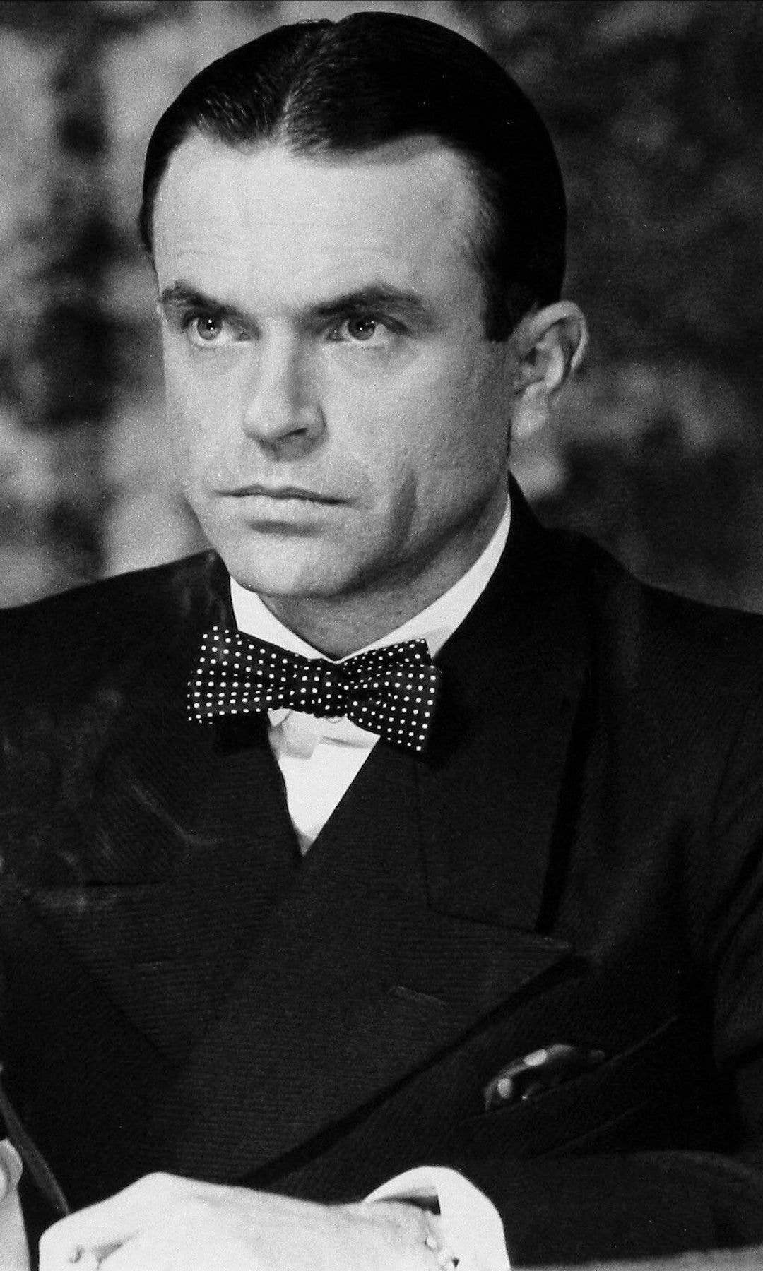 Black-and-white image of Sam Neill in Reilly, Ace of Spies