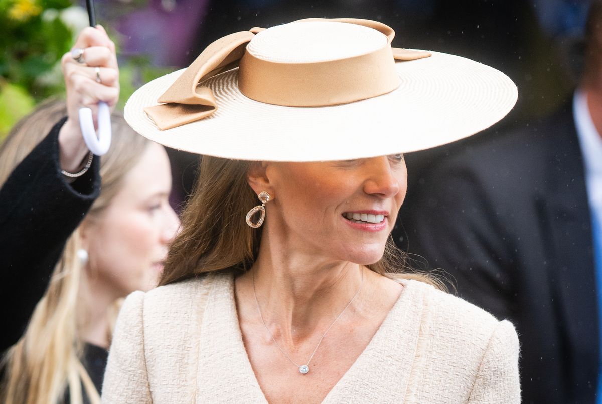 Kate Middleton completed her wedding guest look with a striking wide-brim hat by Jane Taylor London, a sophisticated nod to Britain's enduring royal wedding traditions.