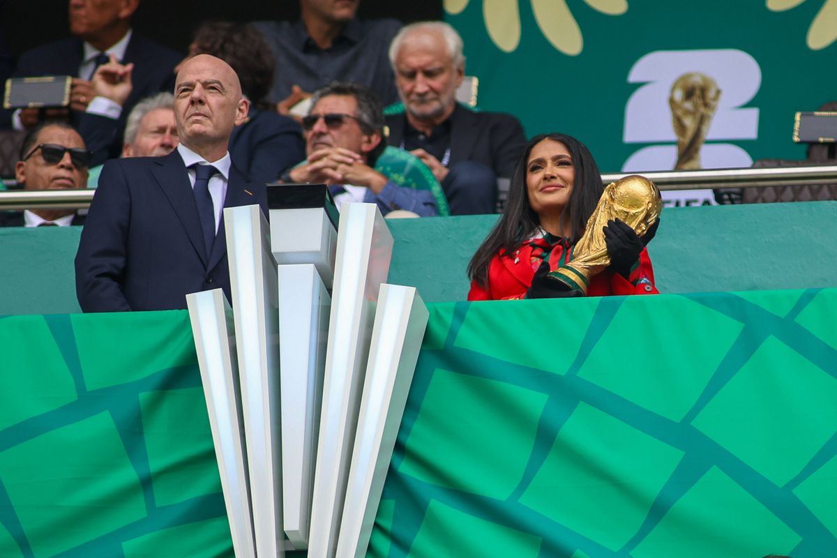 Salma Hayek gives World Cup trophy to FIFA President Gianni Infantino during the FIFA World Cup 2026 Group A match between Mexico and South Africa at Mexico City Stadium on June 11, 2026 in Mexico City