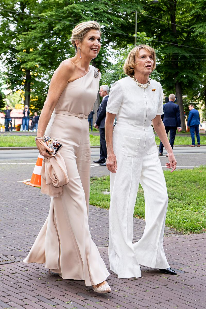 Queen Máxima changed into a glamorous dusky pink one-shoulder jumpsuit by Natan for an evening reception in The Hague.