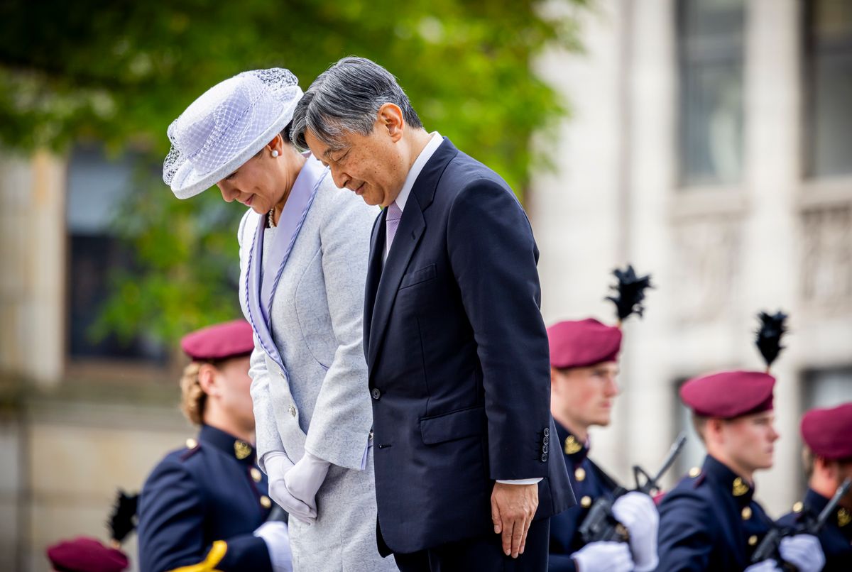 Empress Masako's sophisticated silk skirt suit reflected the graceful restraint synonymous with Japanese imperial fashion.