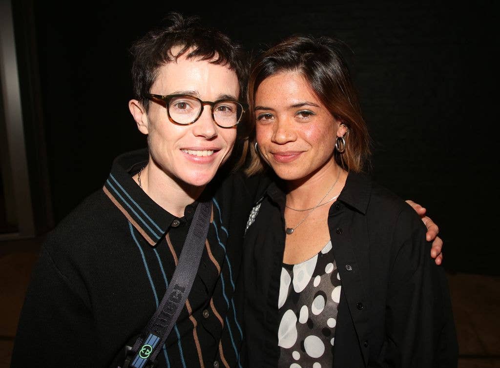 Elliot Page and girlfriend Julia Shiplett pose at the opening night of "Julio Torres Color Theories" at The Performance Space New York on September 10, 2025 in New York City. 