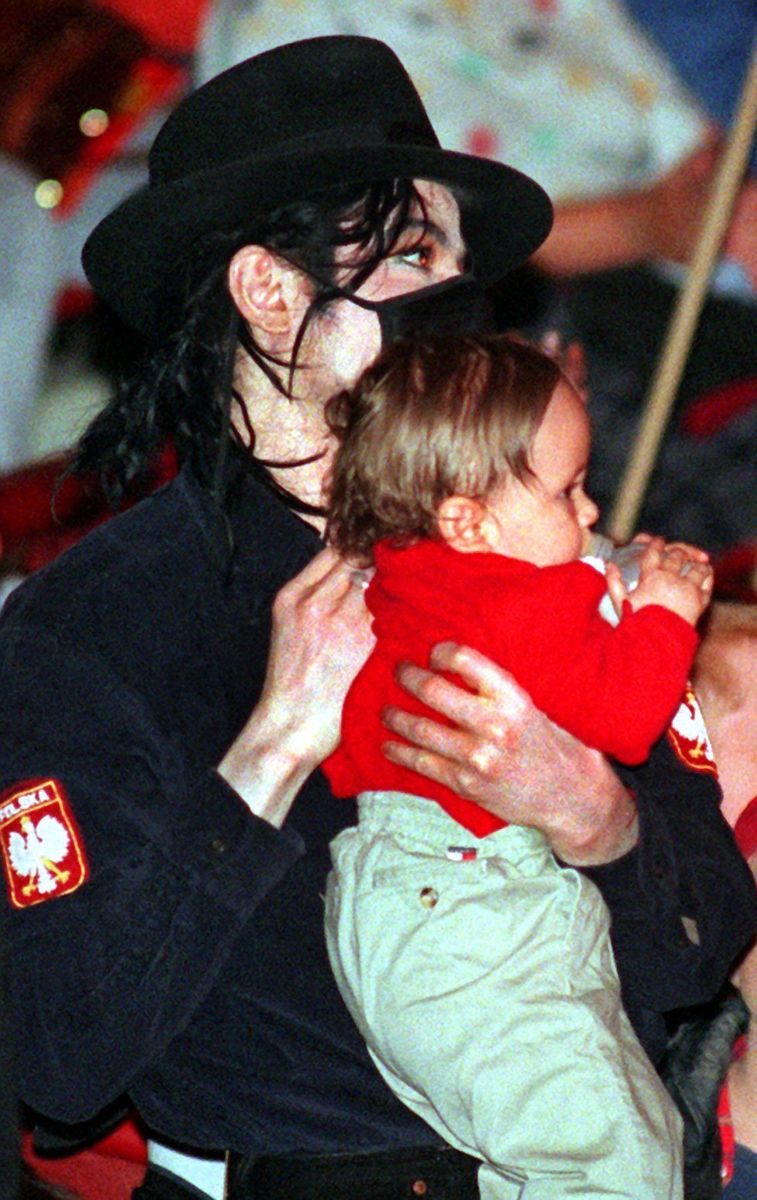 Michael holds Prince in 1998