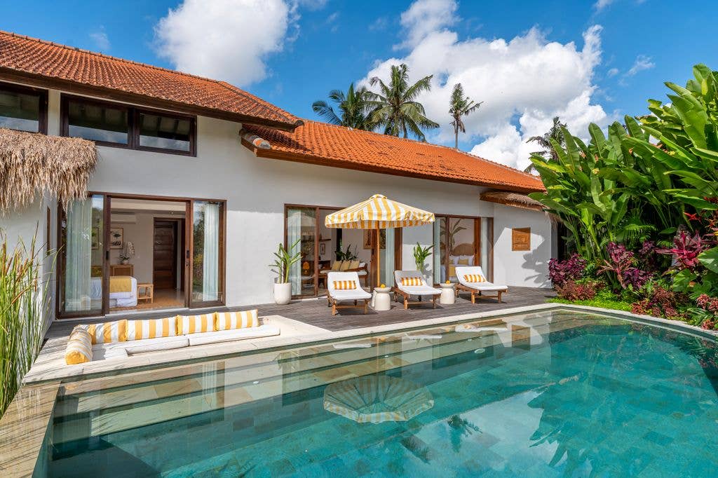 The villas are surrounded by lush greenery