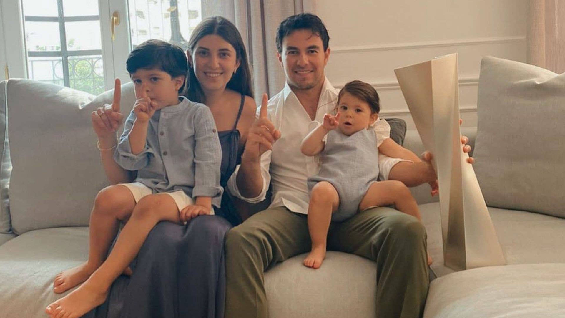 Sergio Perez with wife Carola and their two children on a sofa