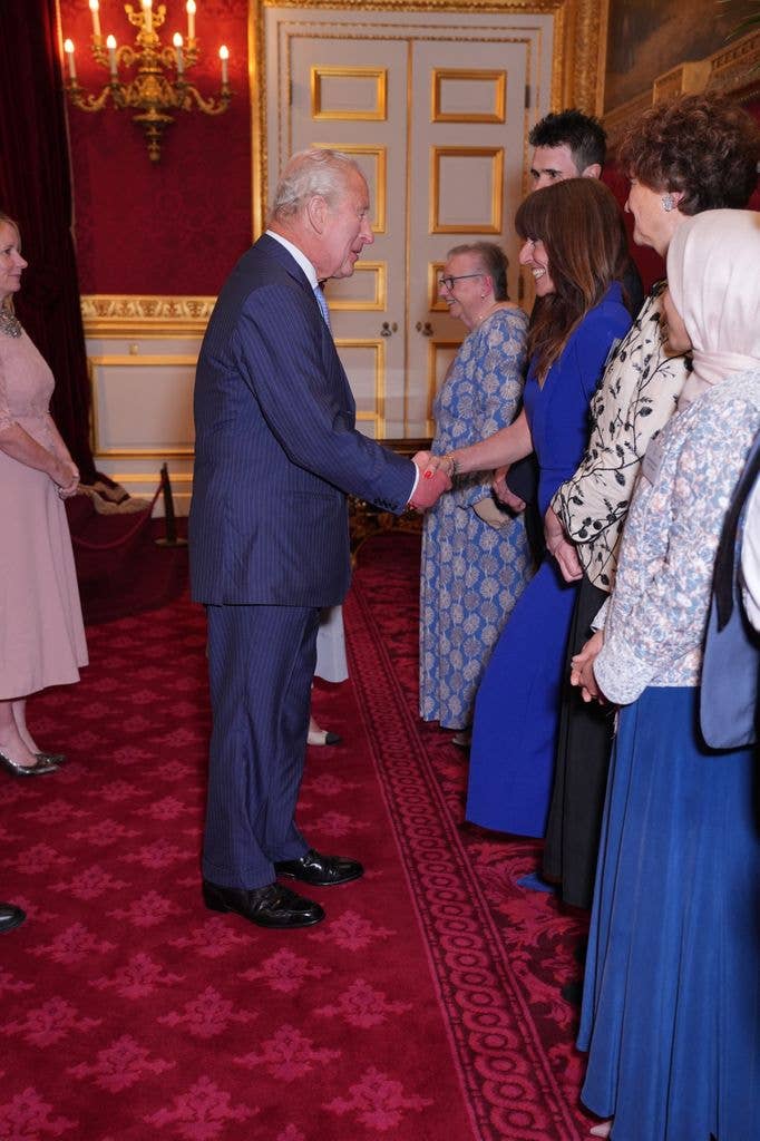 Davina McCall curtsying when meeting King Charles