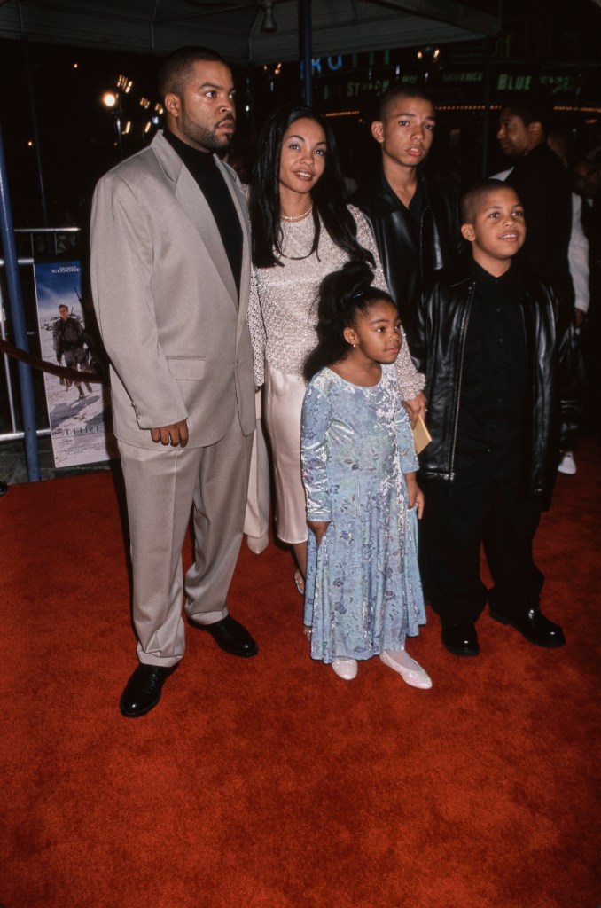 American rapper and actor Ice Cube with his wife, Kimberly Woodruff, and their children, O'Shea Jackson Jr, Darrell Jackson, and Kareema Jackson, attend the Westwood premiere of 'Three Kings', held at the Mann Village Theatre in the Westwood neighbourhood of Los Angeles, California, 27th September 1999. (Photo by Vinnie Zuffante/Getty Images)