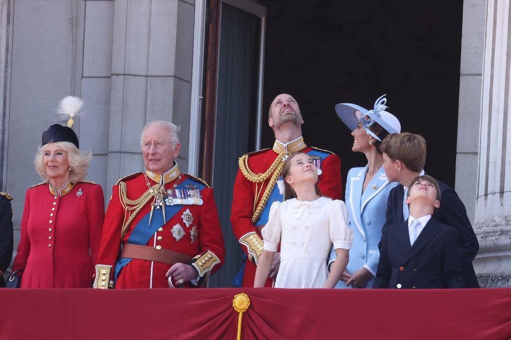 The Princess of Wales looking at Prince William as he gazes to the sky