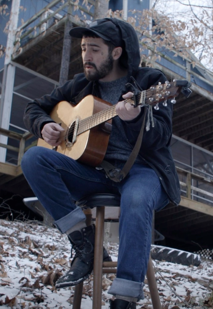 Hayden Karchmer performs under the stage name The Hill Country Devil and has built a devoted following in the Americana and folk music scene.