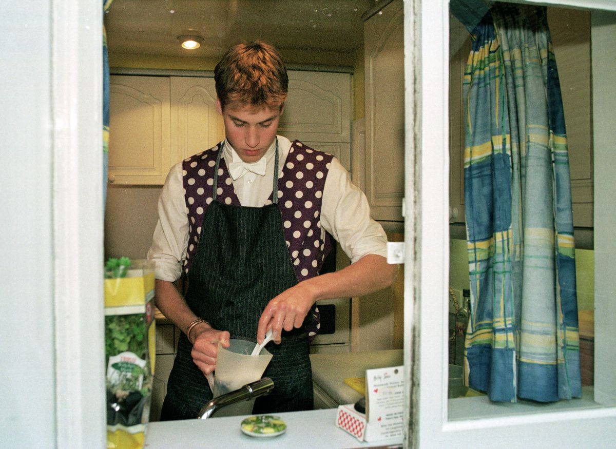Prince William at Eton taking part in a cookery module available to students at Eton College, Windsor. 
