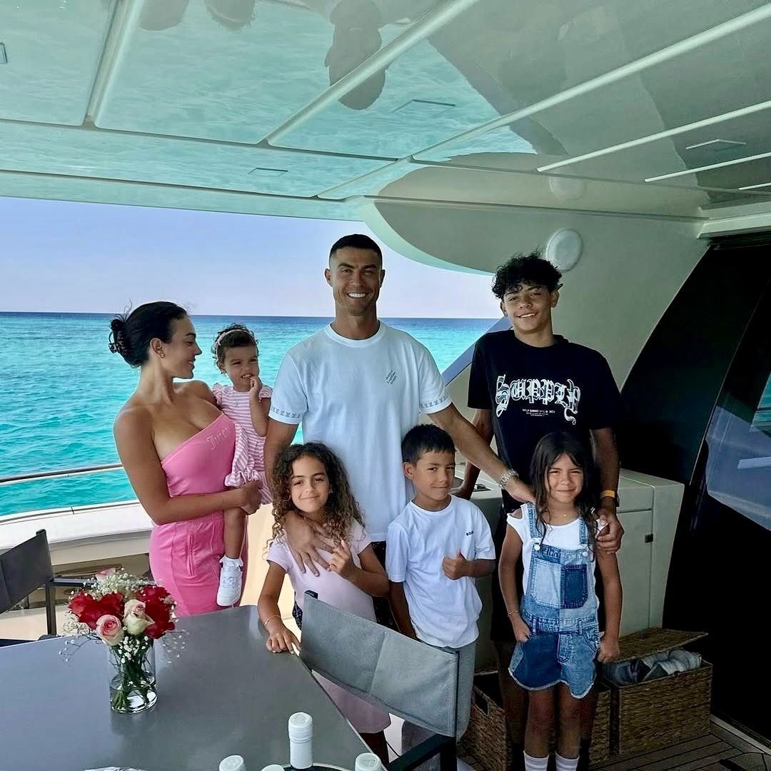 Cristiano Ronaldo celebrates his son Cristiano Jr. as Portugal begins its World Cup journey