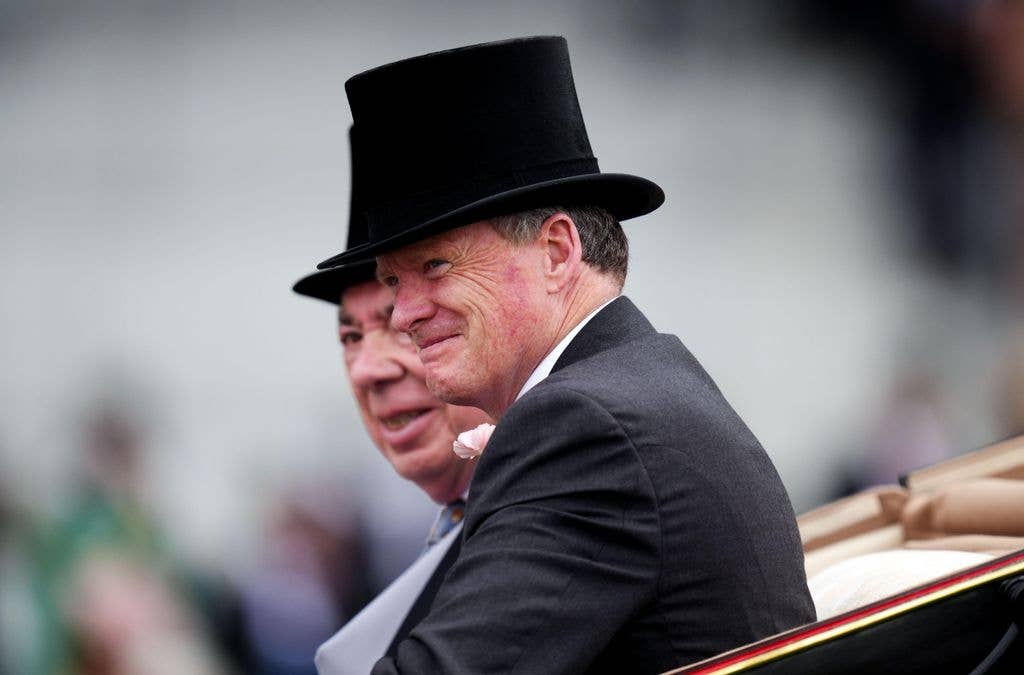 Lord Benyon arrives by carriage on day four of Royal Ascot at Ascot Racecourse