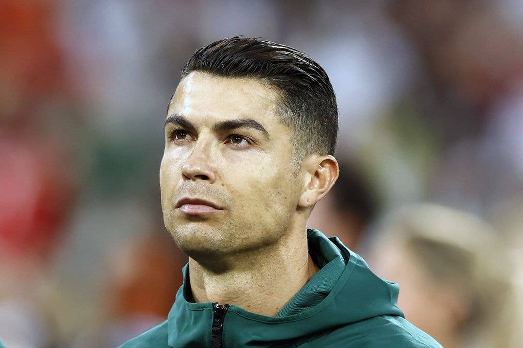 cristiano ronaldo close up wearing green jacket
