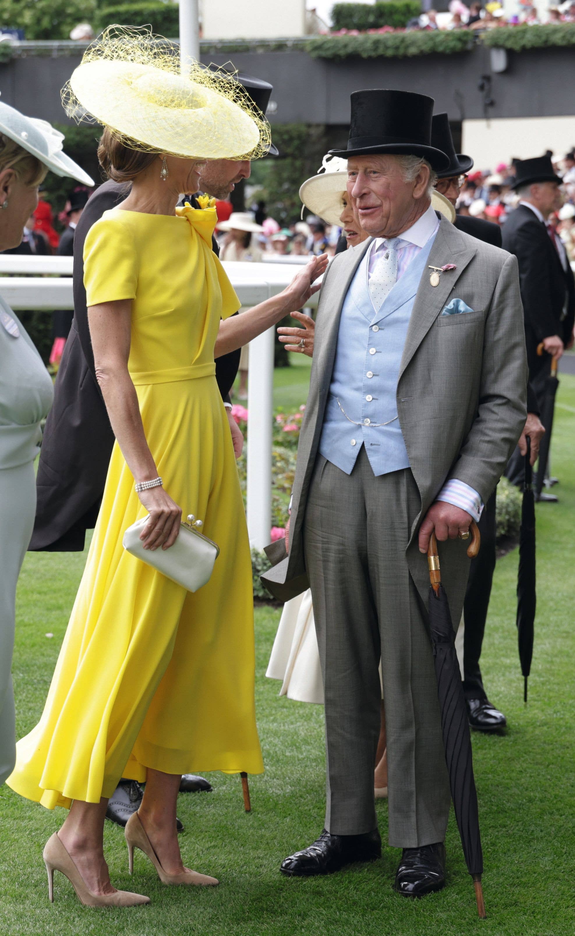 Kate smiles with King Charles