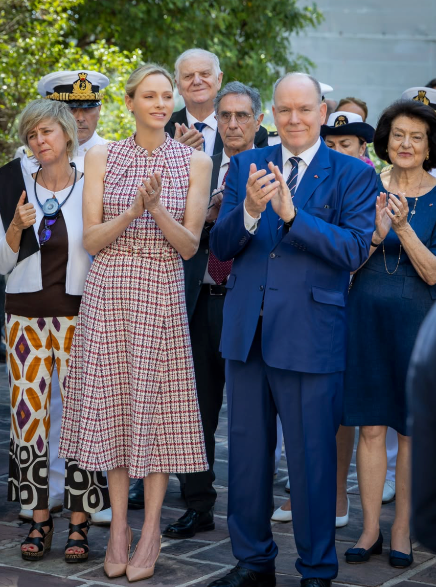 Princess Charlene looked effortlessly elegant in a sleeveless tweed midi dress paired with classic nude pumps during the official engagement.