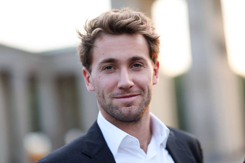 Casper Ruud in a shirt and suit in 2024.