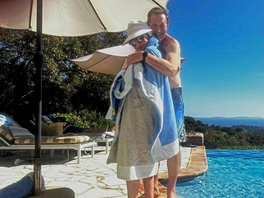 Joan also shared a photo of husband Percy wrapping  a towel around her 