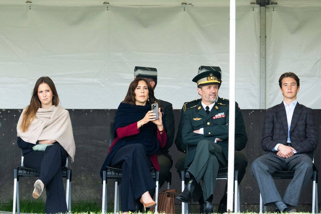 Queen Mary was spotted taking pictures on her phone