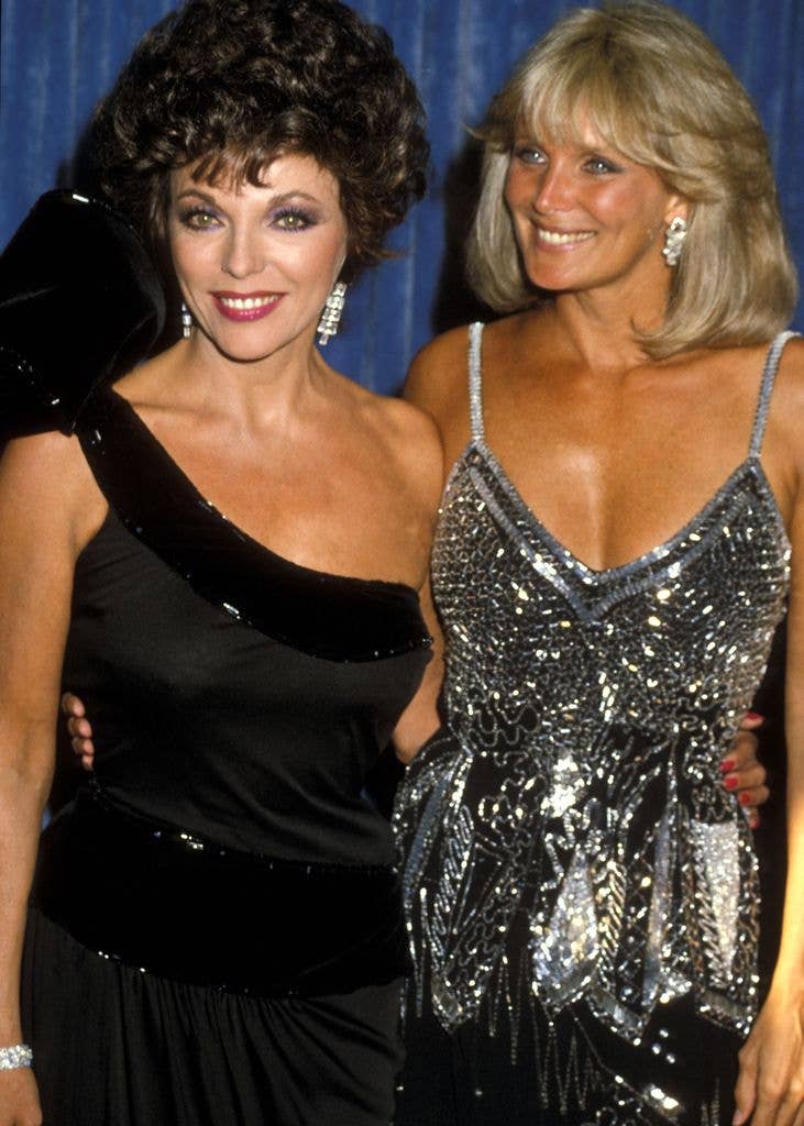 Actresses Joan Collins and actress Linda Evans attend the 35th Annual Primetime Emmy Awards on September 25, 1983