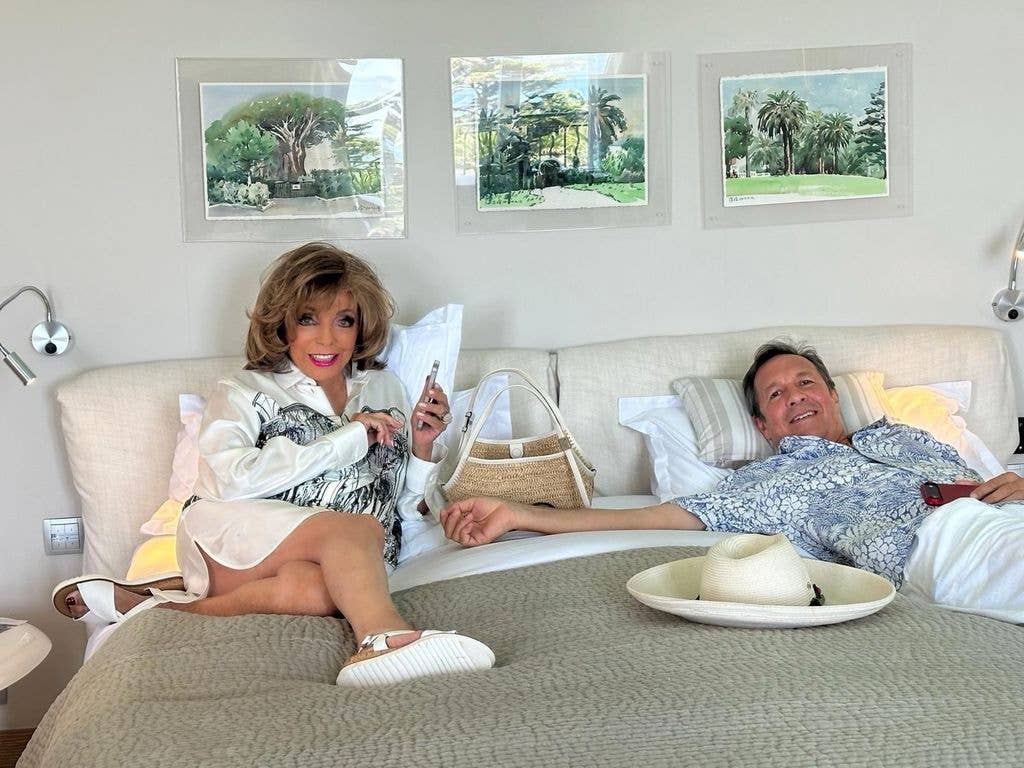 Another photo saw the couple together on a bed 