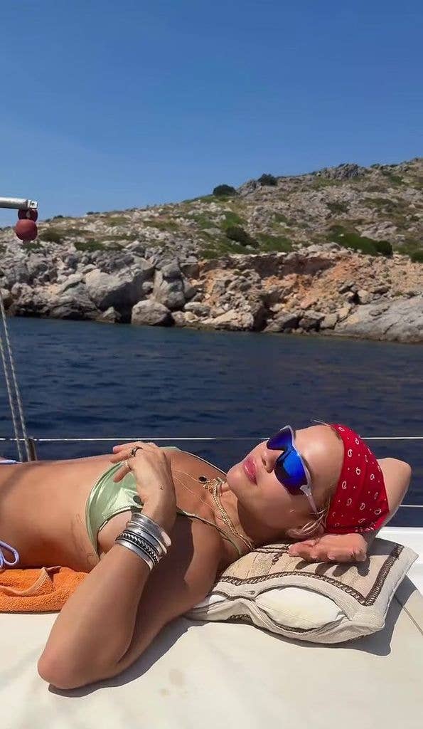 photo of rita ora in metallic green bikini greece