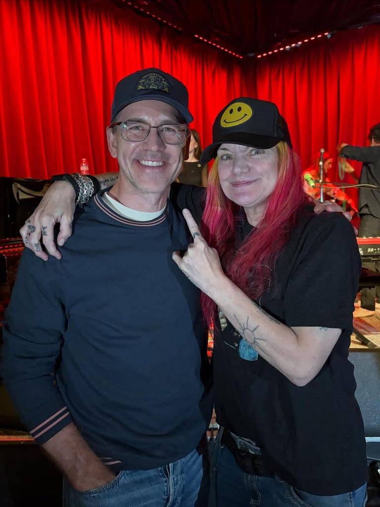Brian Dietzen and Pauley Perrette pose for a photo at a concert, shared on Instagram