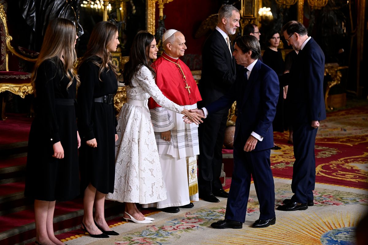 Leonor and Sofía opted not to wear mantillas, embracing a modern interpretation of Vatican protocol during the Pope's visit to Spain.