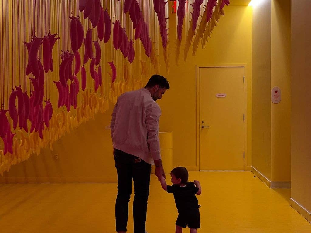 lindsay lohan husband holding sons hand