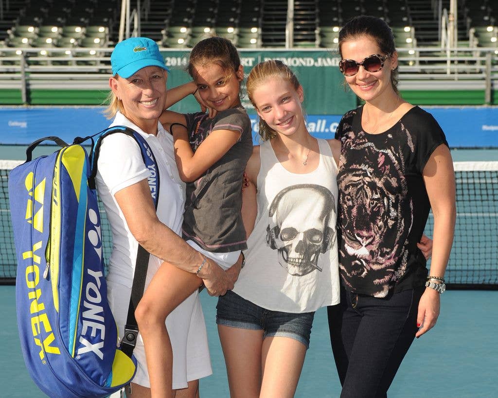 Martina Navratilova, Emma Navratilova, Victoria Navratilova and Julia Lemigova pose at the 25th Annual Chris Evert/Raymond James Pro-Celebrity Tennis Classic  at Delray Beach Tennis Center on November 23, 2014 in Delray Beach, Florida