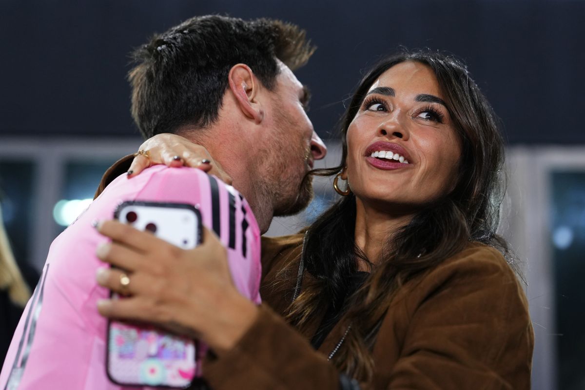 Lionel Messi #10 of Inter Miami CF is congratulated by his wife Antonela Roccuzzo after winning the Audi 2025 MLS Cup Eastern Conference Final match 