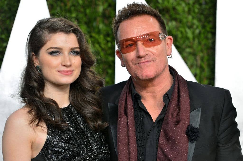 Actress Eve Hewson and singer Bono arrive at the 2013 Vanity Fair Oscar Party hosted by Graydon Carter at Sunset Tower on February 24, 2013 in West Hollywood, California.