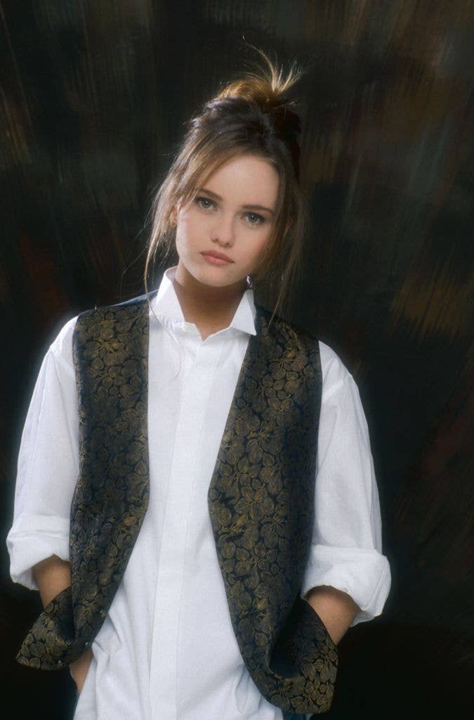 Vanessa Paradis poses in a white shirt and waistcoat.