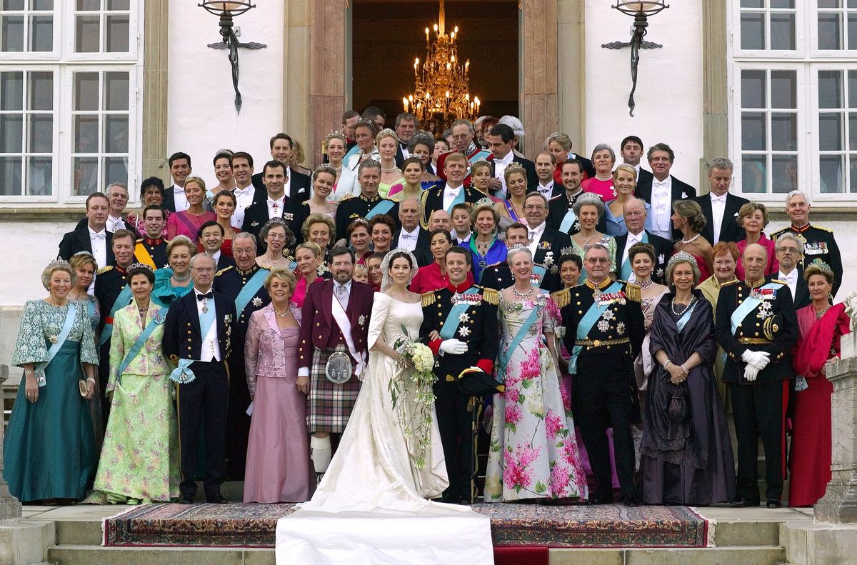 Crown Prince Frederik and Crown Princess Mary on their wedding, posing with their guests at Fredensborg Palace