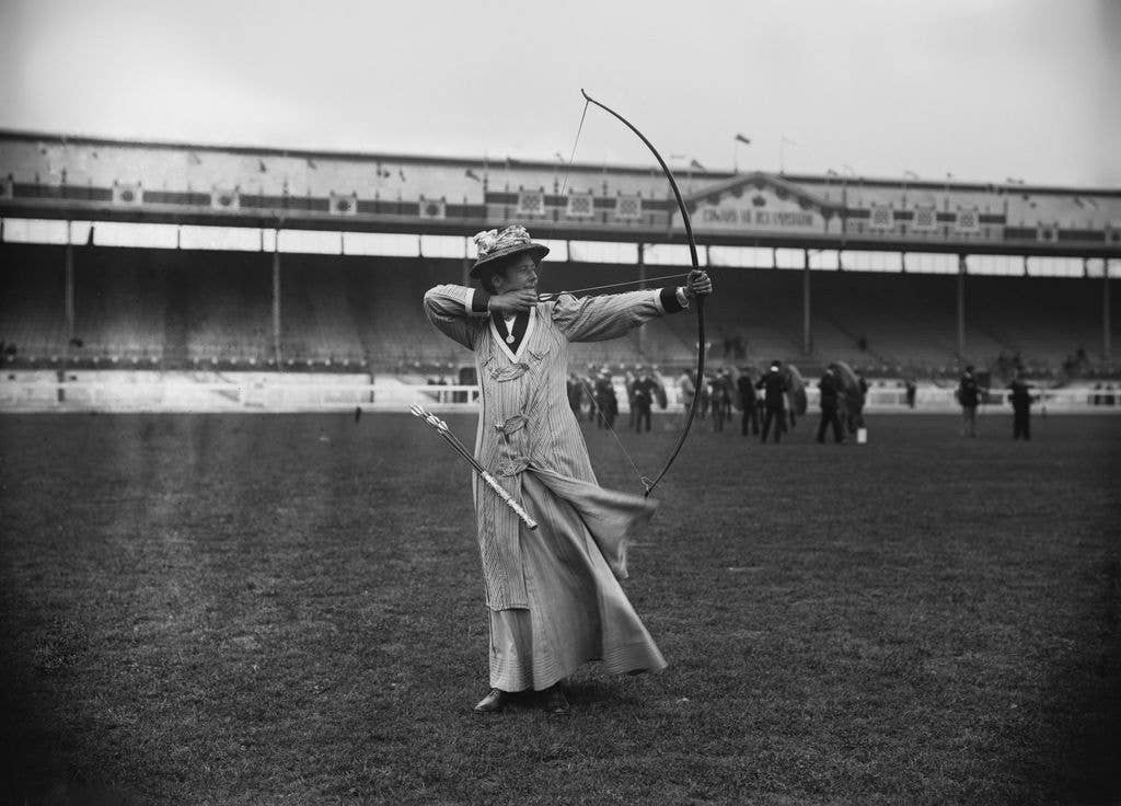 British archer Lottie Dod competes during the Women's Double National Round of the archery competition of the 1908 Summer Olympics, at White City Stadium in London, England, July 1908.